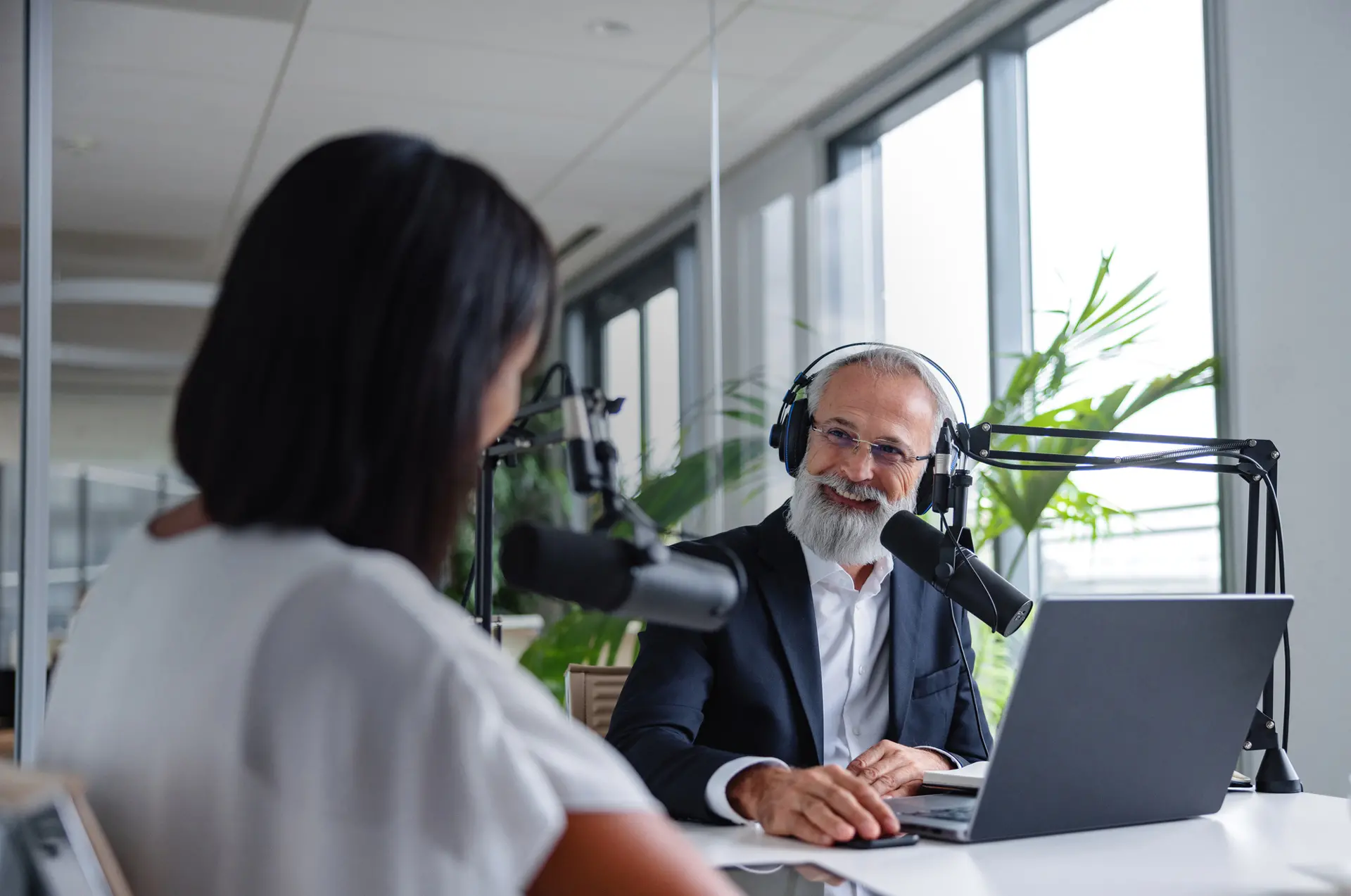 Leerink Partners Podcast - Male and Female banker on a podcast interview session